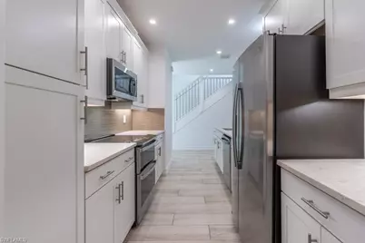 7565 Carnegie Way, Naples, FL 34119 - Photo 8