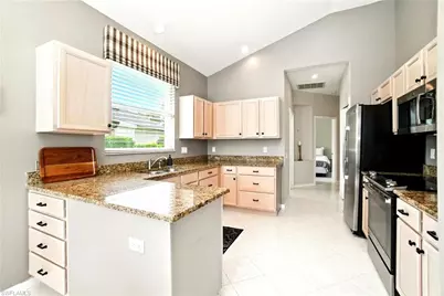 1842 Winding Oaks Way, Naples, FL 34109 - Photo 8