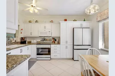 725 Saratoga Cir #A101, Naples, FL 34104 - Photo 6