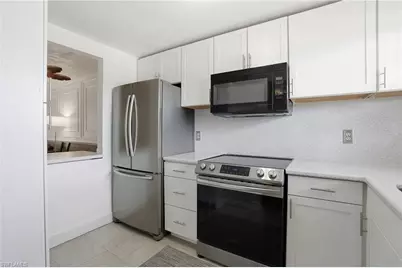 499 Forest Lakes Blvd #203, Naples, FL 34105 - Photo 2