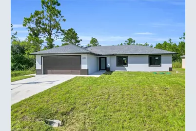 1061 Butler St E, Lehigh Acres, FL 33974 - Photo 1