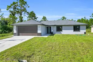 1061 Butler St E, Lehigh Acres, FL 33974 - Photo 1