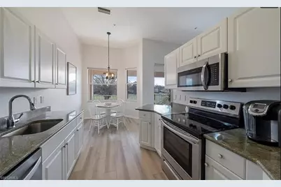 640 Lalique Cir #407, Naples, FL 34119 - Photo 1
