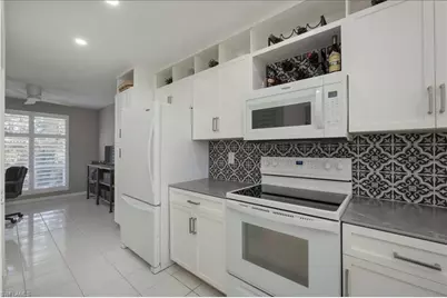 1250 Yesica Ann Cir #E201, Naples, FL 34110 - Photo 6