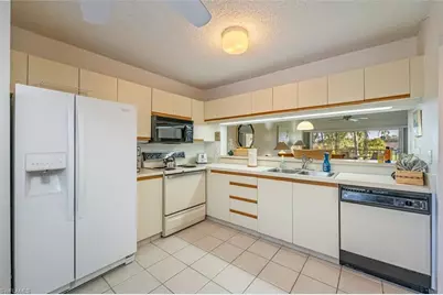 5975 Bloomfield Cir #C302, Naples, FL 34112 - Photo 8