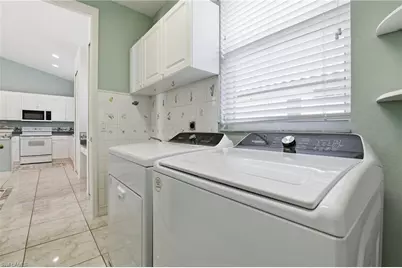 1538 Serenity Cir, Naples, FL 34110 - Photo 24