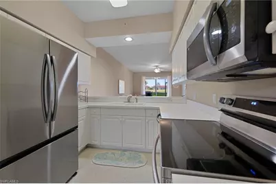 2720 Cypress Trace Cir #2919, Naples, FL 34119 - Photo 8