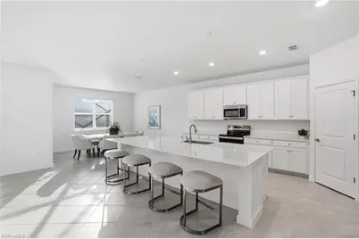 9311 Aqua Overlook Ct, Lehigh Acres, FL 33936 - Photo 12