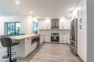 2237 River Reach Dr, Naples, FL 34104 - Photo 1