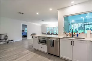 2237 River Reach Dr, Naples, FL 34104 - Photo 6