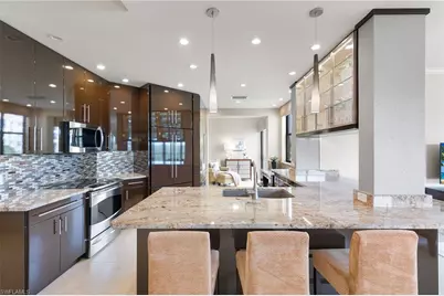 7008 Pelican Bay Blvd #H304, Naples, FL 34108 - Photo 12