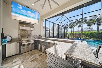 9030 Sorreno Ct, Naples, FL 34119 - Photo 32