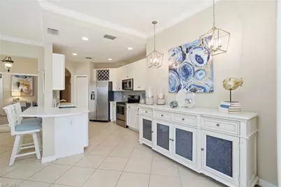 6842 Sterling Greens Dr #102, Naples, FL 34104 - Photo 2