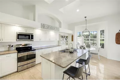 11416 Quail Village Way, Naples, FL 34119 - Photo 6