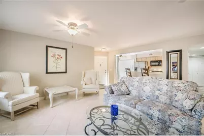 9589 Crescent Garden Dr #C-102, Naples, FL 34109 - Photo 2