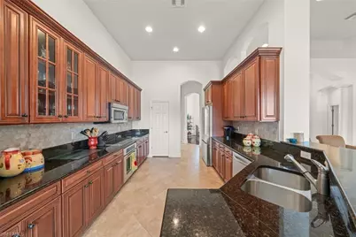 11982 Heather Woods Ct, Naples, FL 34120 - Photo 18