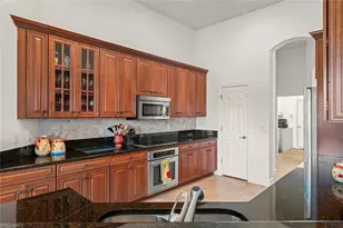 11982 Heather Woods Ct, Naples, FL 34120 - Photo 20