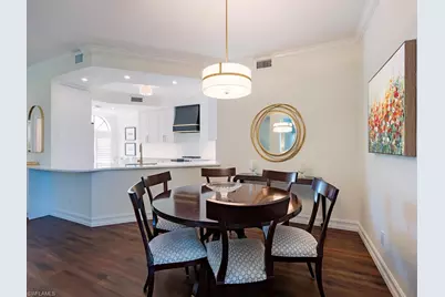 7048 Pelican Bay Blvd #C101, Naples, FL 34108 - Photo 6