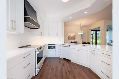 7048 Pelican Bay Blvd #C101, Naples, FL 34108 - Photo 4