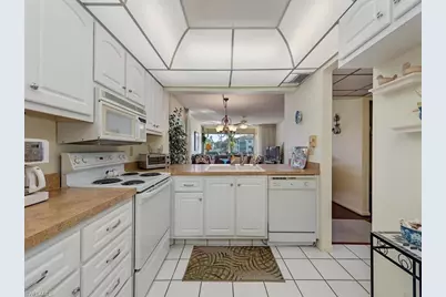 1087 Forest Lakes Dr #1-201, Naples, FL 34105 - Photo 6