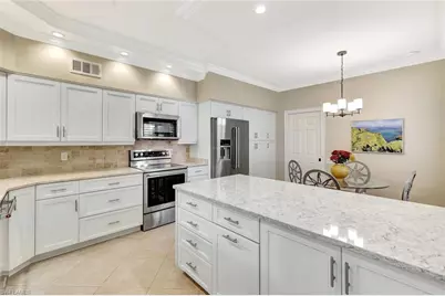 11596 Quail Village Way, Naples, FL 34119 - Photo 2