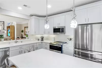 11426 Quail Village Way, Naples, FL 34119 - Photo 12