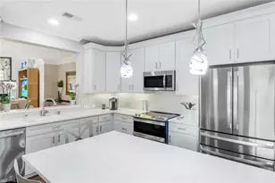 11426 Quail Village Way, Naples, FL 34119 - Photo 12