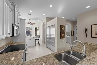 9230 Troon Lakes Dr, Naples, FL 34109 - Photo 8