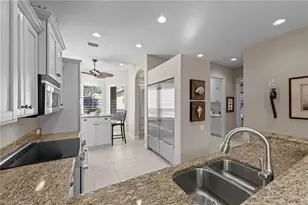 9230 Troon Lakes Dr, Naples, FL 34109 - Photo 8