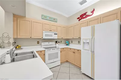 2476 Orchid Bay Dr #W201, Naples, FL 34109 - Photo 12