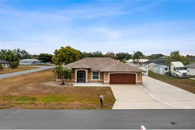 401 Candlewick Cir E, Lehigh Acres, FL 33936 - Photo 46