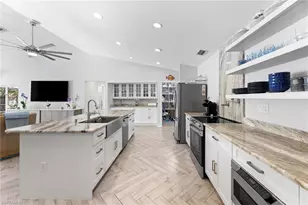 2467 Pinewoods Cir, Naples, FL 34105 - Photo 12