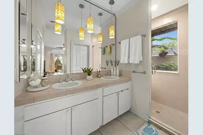 2440 River Reach Dr, Naples, FL 34104 - Photo 36