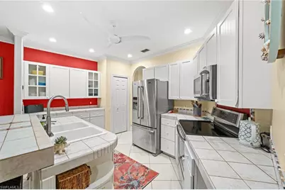 2440 River Reach Dr, Naples, FL 34104 - Photo 24