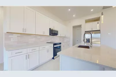2421 NW 24th St, Cape Coral, FL 33993 - Photo 6