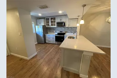 2395 Naples Trace Cir #6, Naples, FL 34109 - Photo 1