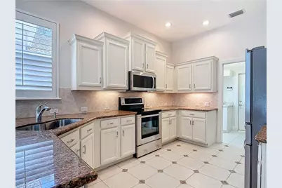9190 Troon Lakes Dr, Naples, FL 34109 - Photo 16
