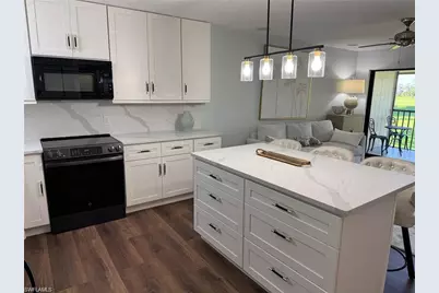 746 Eagle Creek Dr #203, Naples, FL 34113 - Photo 4