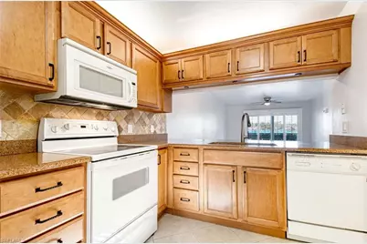 2642 Kings Lake Blvd #102, Naples, FL 34112 - Photo 2