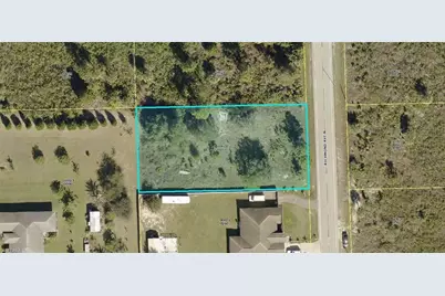 909 Richmond Ave N, Lehigh Acres, FL 33972 - Photo 1
