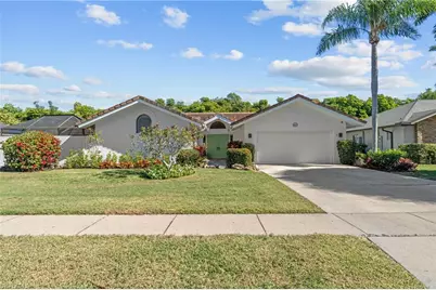 2419 Pine Woods Cir #11, Naples, FL 34105 - Photo 2