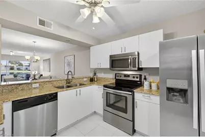 895 New Waterford Dr #J103, Naples, FL 34104 - Photo 12