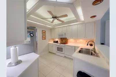 8310 Big Acorn Cir #1003, Naples, FL 34119 - Photo 12