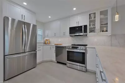 57 High Point Cir W #405, Naples, FL 34103 - Photo 4
