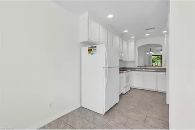 7655 Meadow Lakes Dr #1002, Naples, FL 34104 - Photo 8