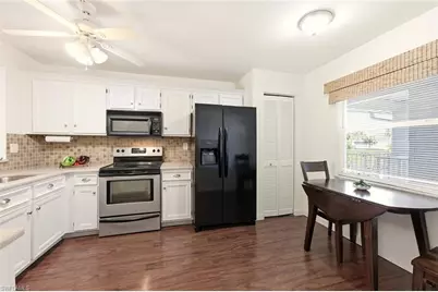 1448 Churchill Cir #S201, Naples, FL 34116 - Photo 2