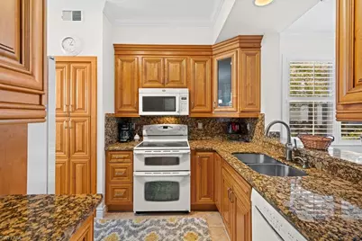 2295 Carrington Ct #1-101, Naples, FL 34109 - Photo 6