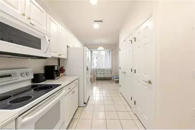 4843 Hampshire Ct #106, Naples, FL 34112 - Photo 2