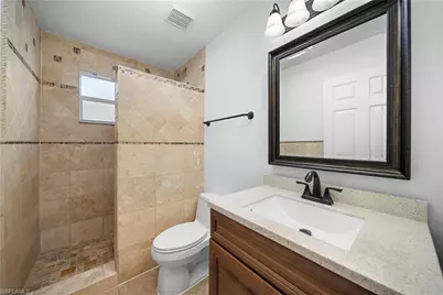 10027 Boca Cir, Naples, FL 34109 - Photo 28