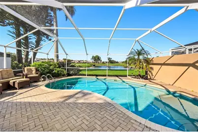 11822 Quail Village Way, Naples, FL 34119 - Photo 2
